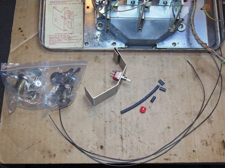 Credit button assembly