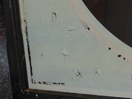 Monitor glass flaking - back