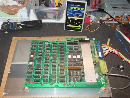 Frogger game PCB on the bench